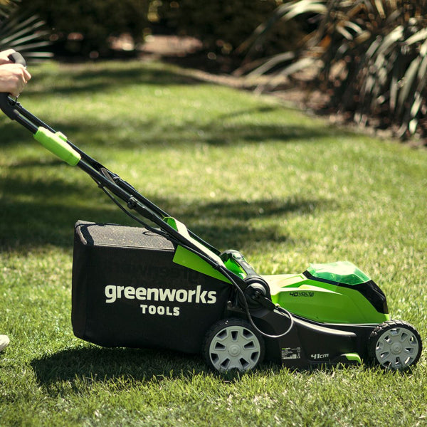 Greenworks 40v 41cm cordless lawnmower in use side view