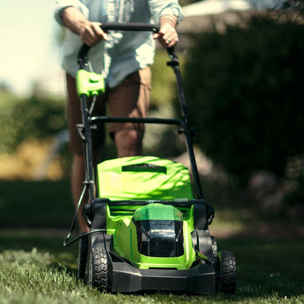 Greenworks 40v 41cm cordless lawnmower in use