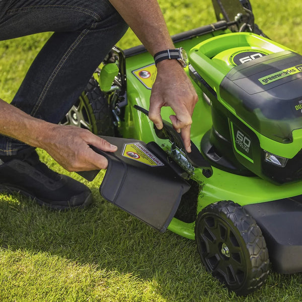 Side view of Greenworks 60V cordless lawnmower showing side discharge