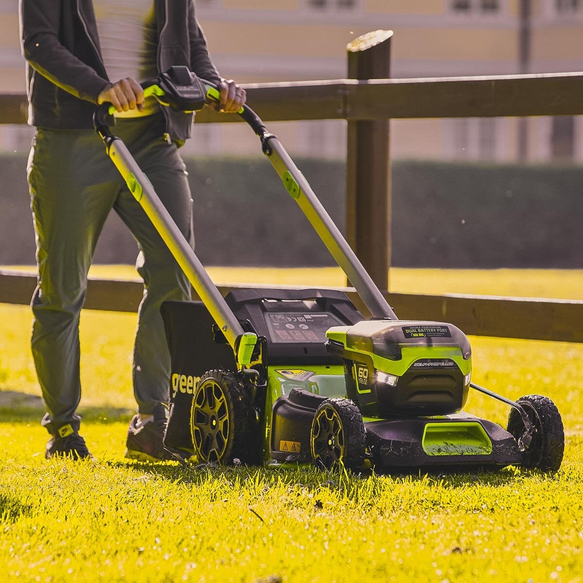 60V Greenworks cordless lawnmower in use