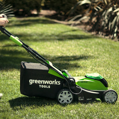 Greenworks 40v 41cm cordless lawnmower in use side view