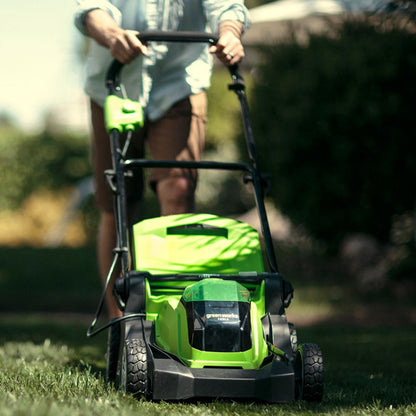 Greenworks 40v 41cm cordless lawnmower in use
